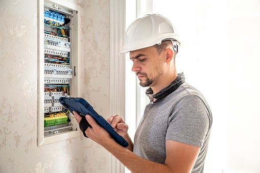 Electrician Performing a Safety Inspection