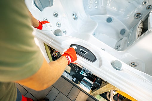 A Technician Adjusting Hot Tub Electrical Wiring in San Jose, CA