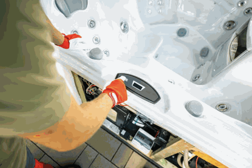 Technician working on a hot tub’s wiring and controls in San Jose, CA
